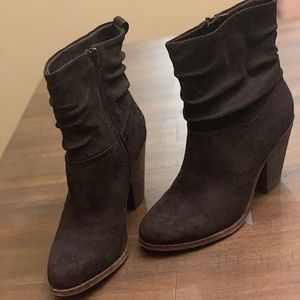 Black wedge slouched Fergie bootie.